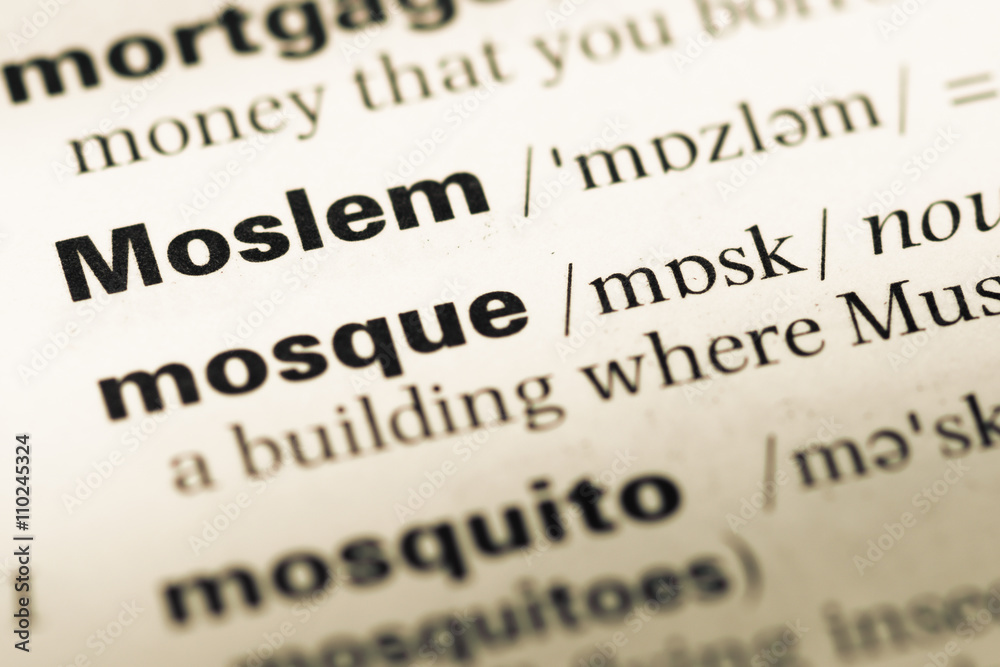 Close up of old English dictionary page with word moslem Close up of old English dictionary page with word moslem