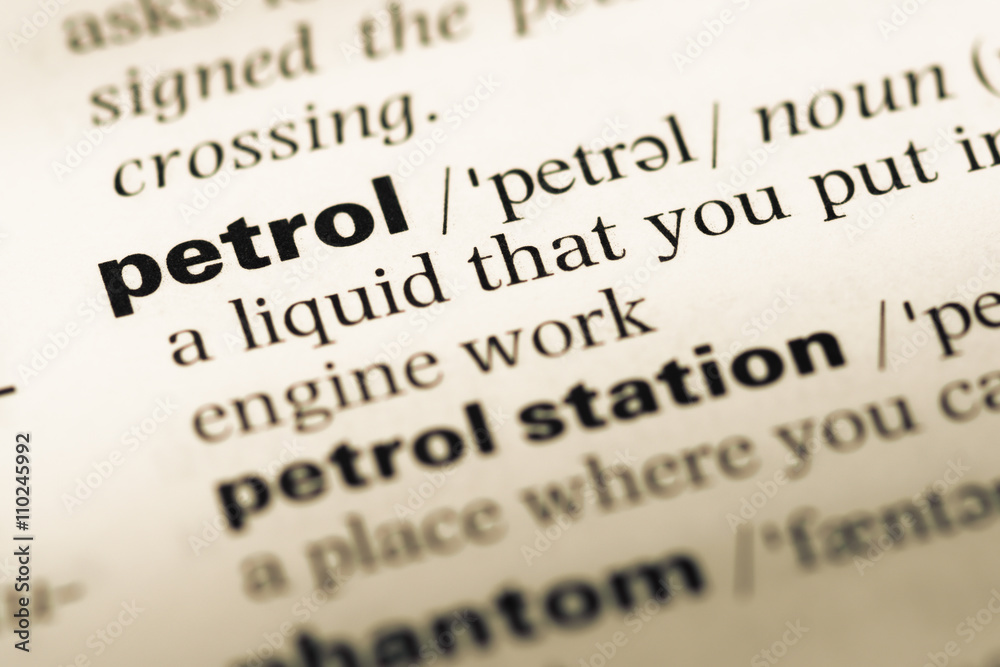 Close up of old English dictionary page with word petrol