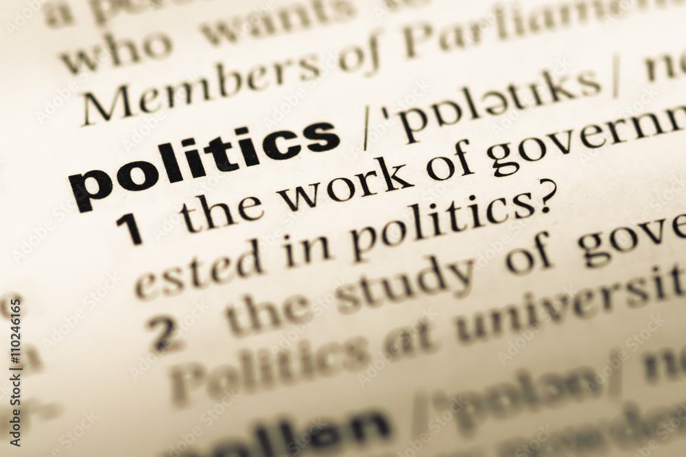 Close up of old English dictionary page with word politics Close up of old English dictionary page with word politics
