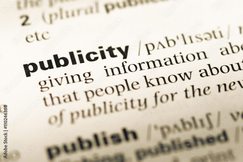 Close up of old English dictionary page with word publicity Close up of old English dictionary page with word publicity