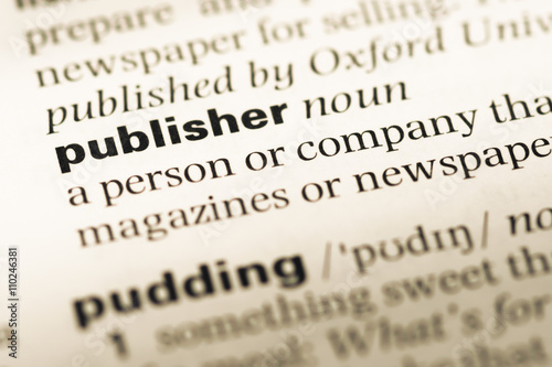 Fotografie Close up of old English dictionary page with word publisher