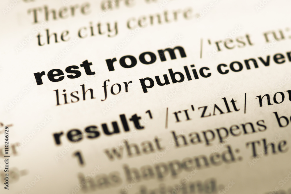 Close up of old English dictionary page with word rest room Close up of old English dictionary page with word rest room