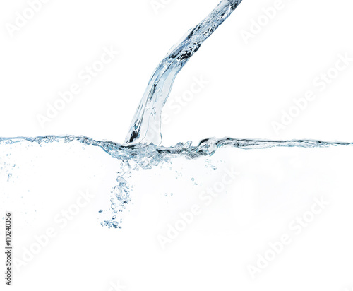 Water pouring splash and bubbles on white background