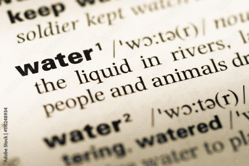 Close up of old English dictionary page with word water Close up of old English dictionary page with word water