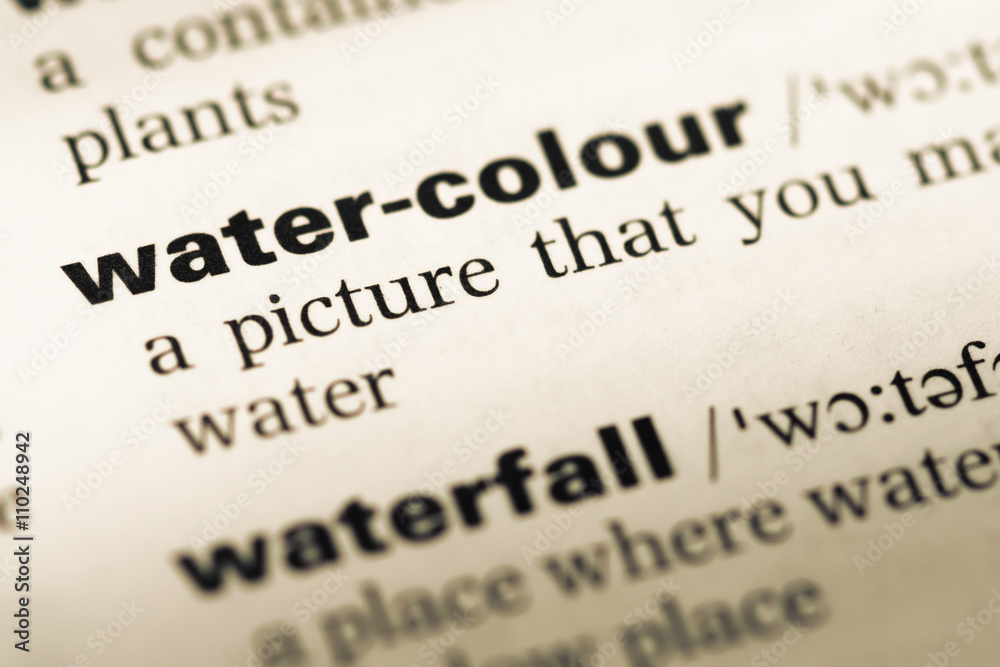 Close up of old English dictionary page with word water colour Close up of old English dictionary page with word water colour
