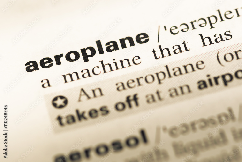 Close up of old English dictionary page with word aeroplane Close up of old English dictionary page with word aeroplane