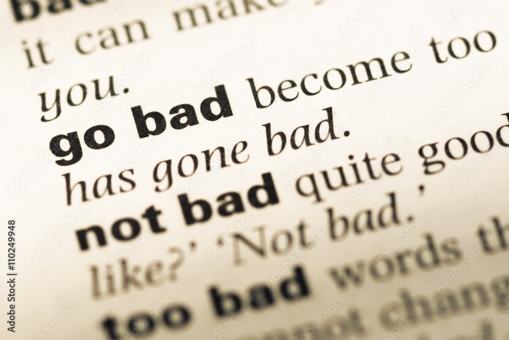 Close up of old English dictionary page with word go bad Close up of old English dictionary page with word go bad