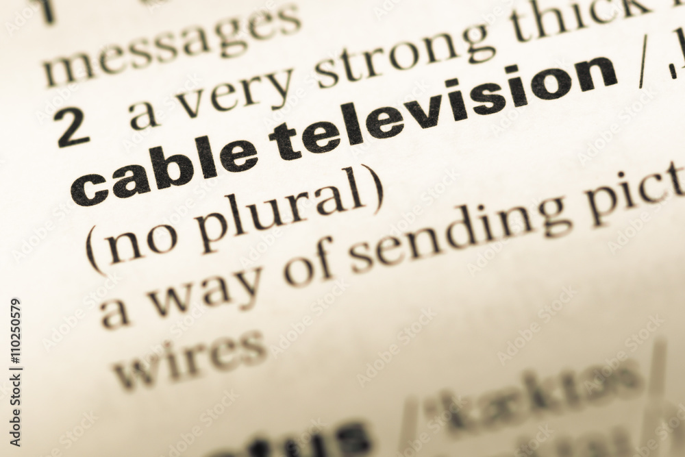 Close up of old English dictionary page with word cable televisi Close up of old English dictionary page with word cable televisi