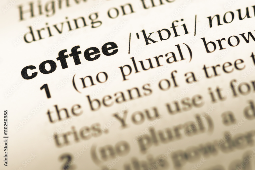 Close up of old English dictionary page with word coffee Close up of old English dictionary page with word coffee