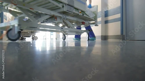 Patient Transportation in Hospital on Surgical Bed
