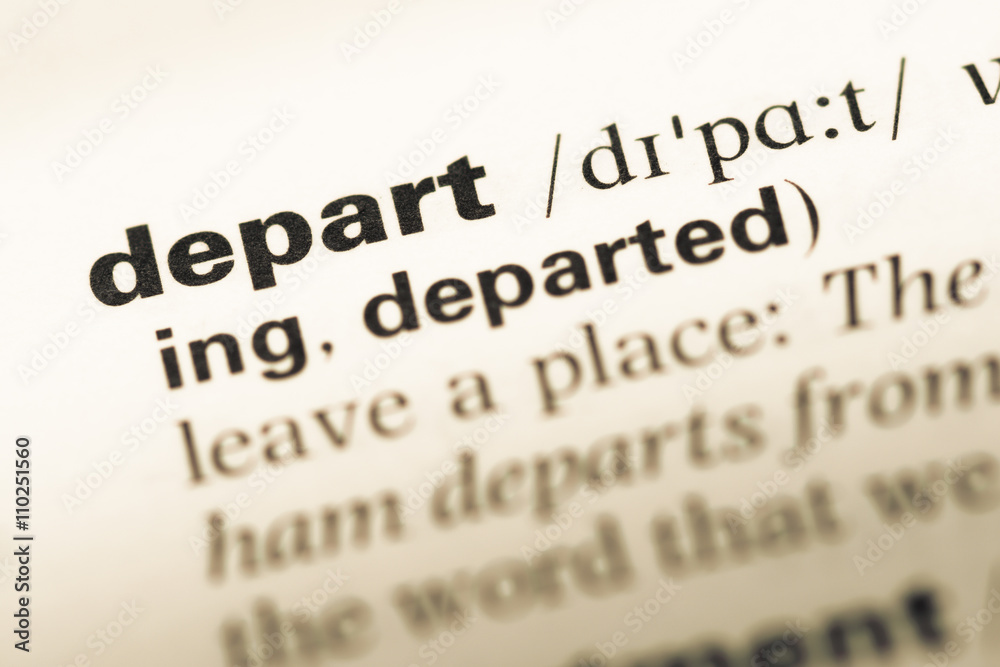 Close up of old English dictionary page with word depart Close up of old English dictionary page with word depart