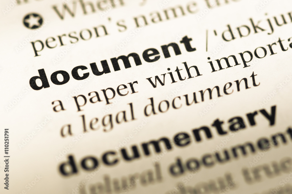 Close up of old English dictionary page with word document Close up of old English dictionary page with word document