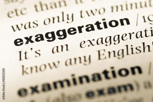 Photos Close up of old English dictionary page with word exaggeration