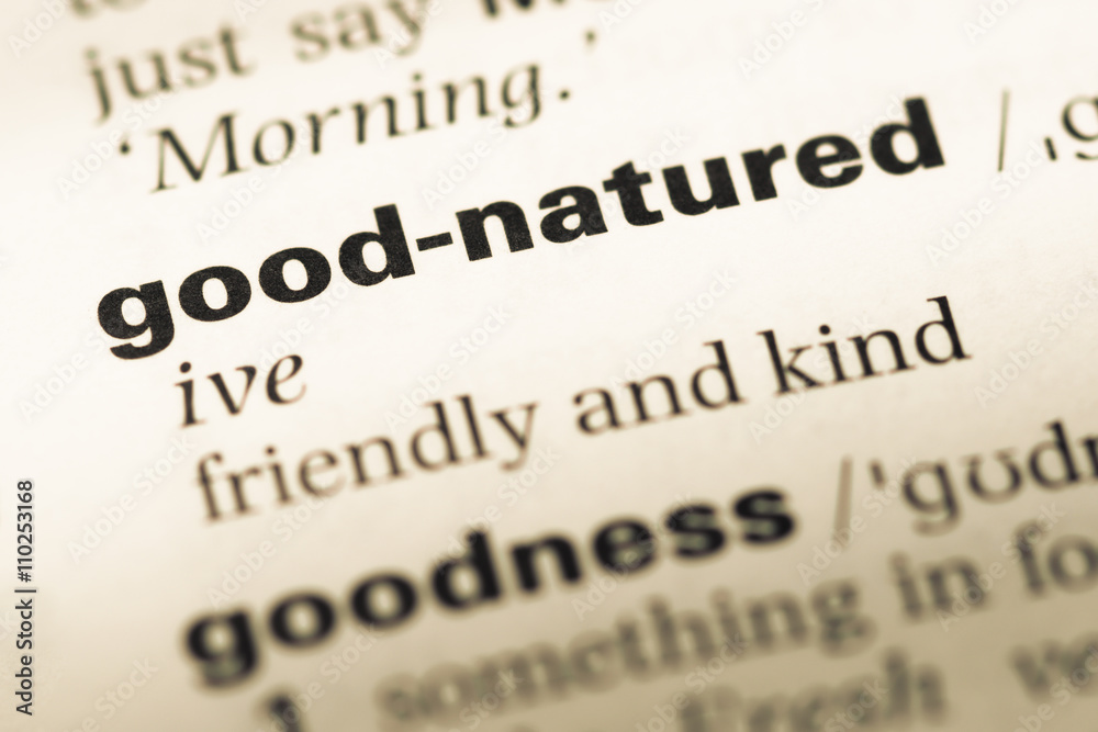 Close up of old English dictionary page with word good natured Close up of old English dictionary page with word good natured