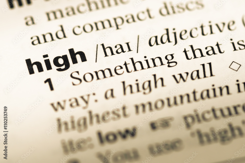 Close up of old English dictionary page with word high Close up of old English dictionary page with word high