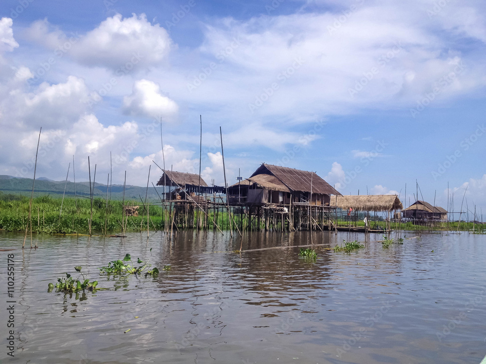 Traditional floating village houses in Inle Lake, Myanmar