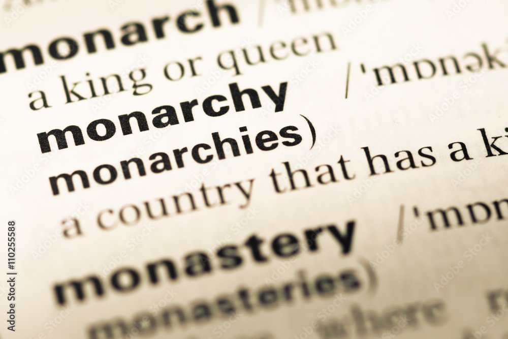 Close up of old English dictionary page with word monarchy Close up of old English dictionary page with word monarchy