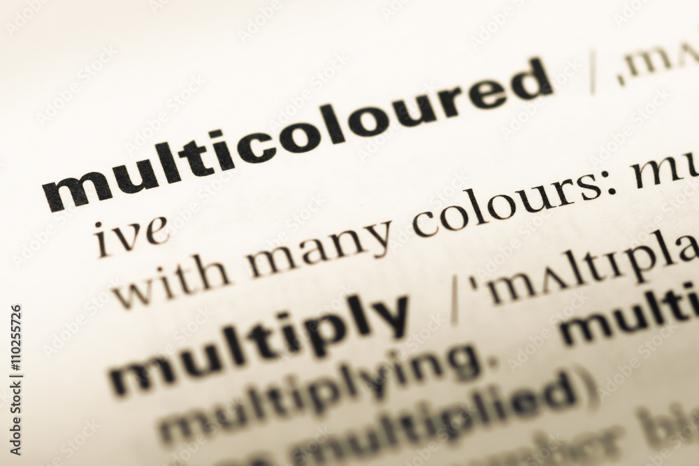 Close up of old English dictionary page with word multicoloured Close up of old English dictionary page with word multicoloured