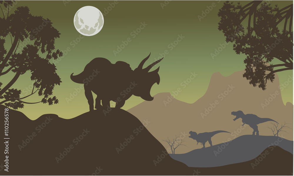 Silhouette of triceratops and baby T-Rex