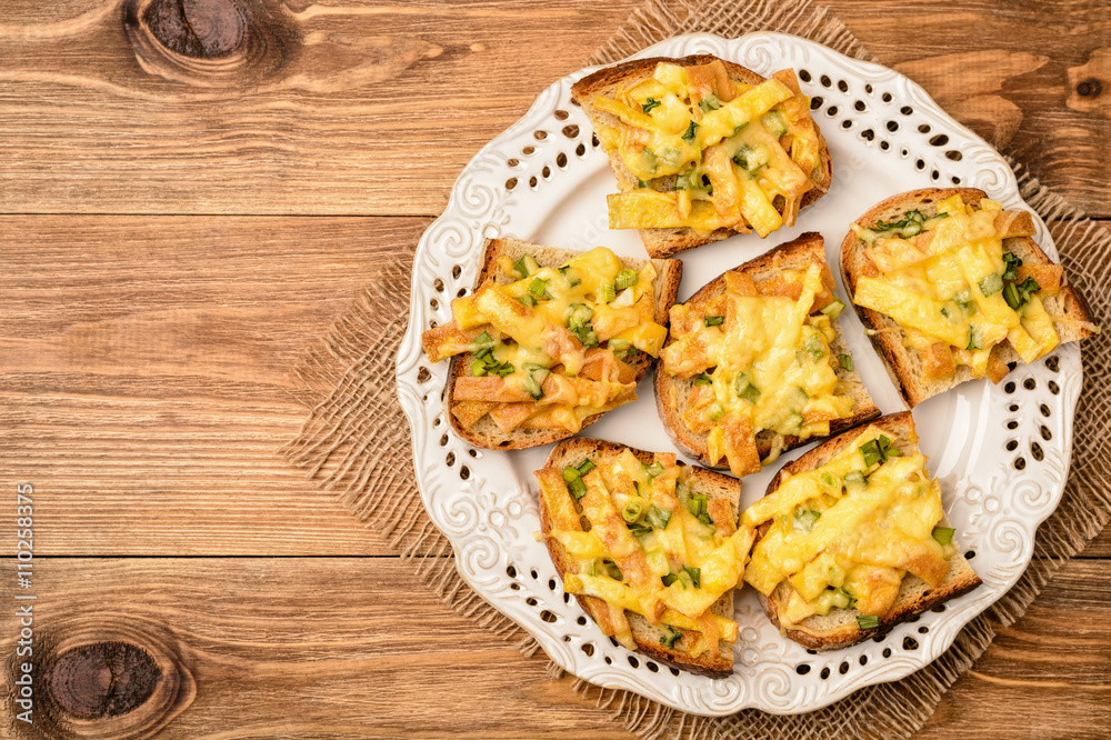 Sandwiches with fried eggs and cheese baked in oven. Sandwiches with fried eggs and cheese baked in oven.