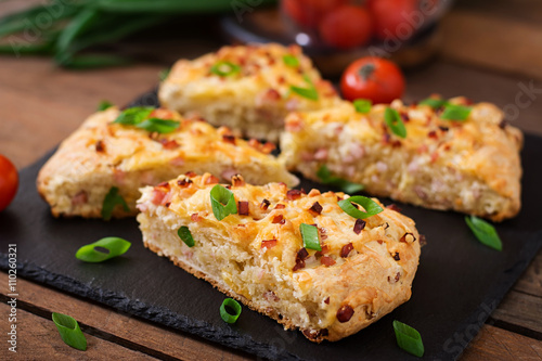 Soda scones (bread)  with ham, cheese and chives. English cuisine.