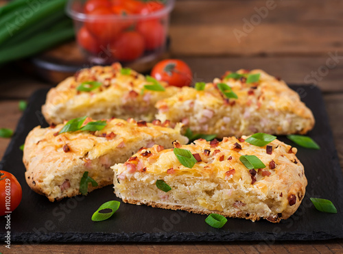 Soda scones (bread) with ham, cheese and chives. English cuisine.