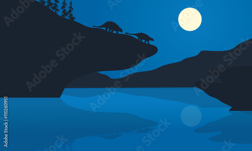 Silhouette of ankylosaurus at the night