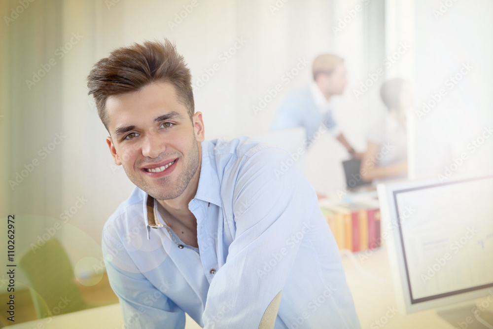 Portrait of smiling office worker Portrait of smiling office worker
