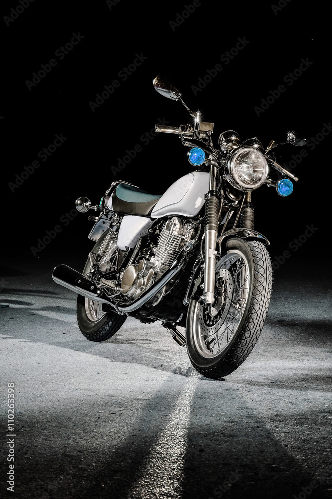 Fototapeta premium Vintage sport bike on a black background