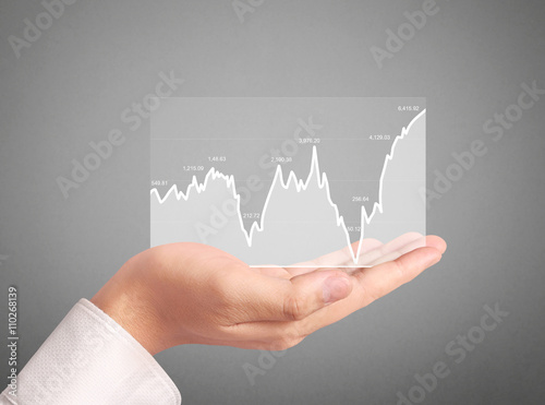  stock financial graph in hand