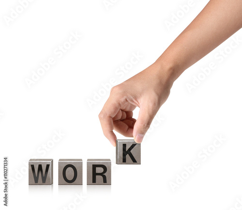 . Closeup  hand putting together word