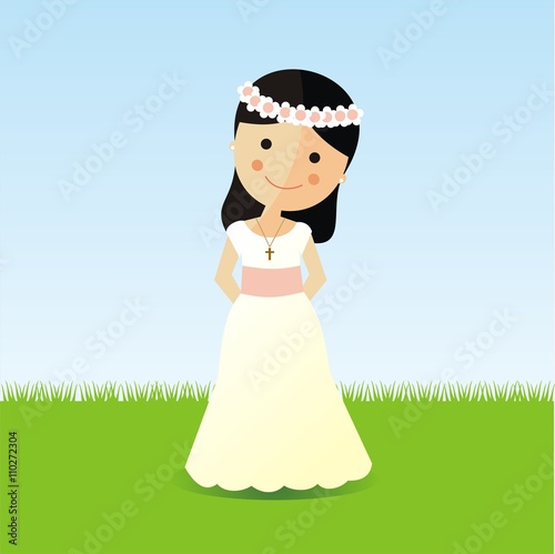 Primera comunión. Niña con un vestido blanco sobre un fondo de jardín