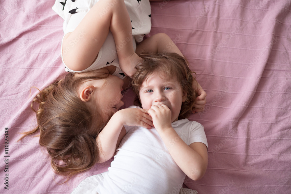 sibling relationships, children's secrets, hug, close up, domest sibling relationships, children's secrets, hug, close up, domest