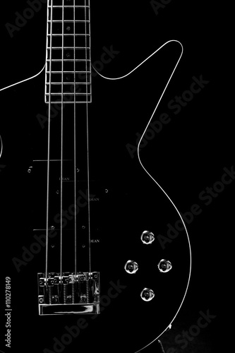 Body of a classic black bass guitar