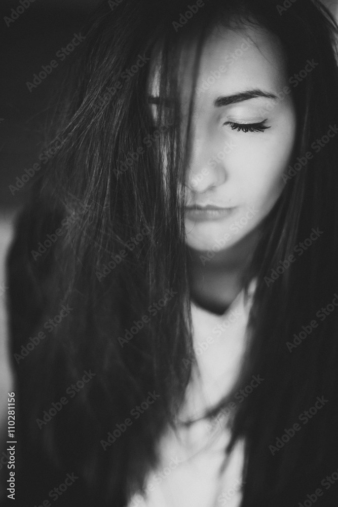 beauty portrait of sensual young beautiful brunette girl with long black straight hair 