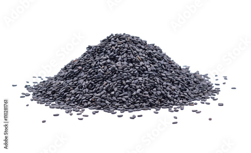 Pile of black sesame seeds on white background