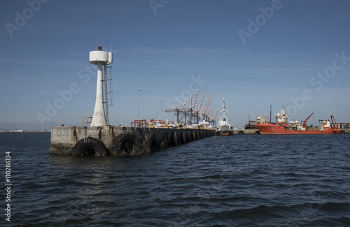 PORT OF CAPE TOWN SOUTH AFRICA - APRIL 2016 - The seawall and entrance to the Transnet operated Port of Cape Town Southern Africa photo