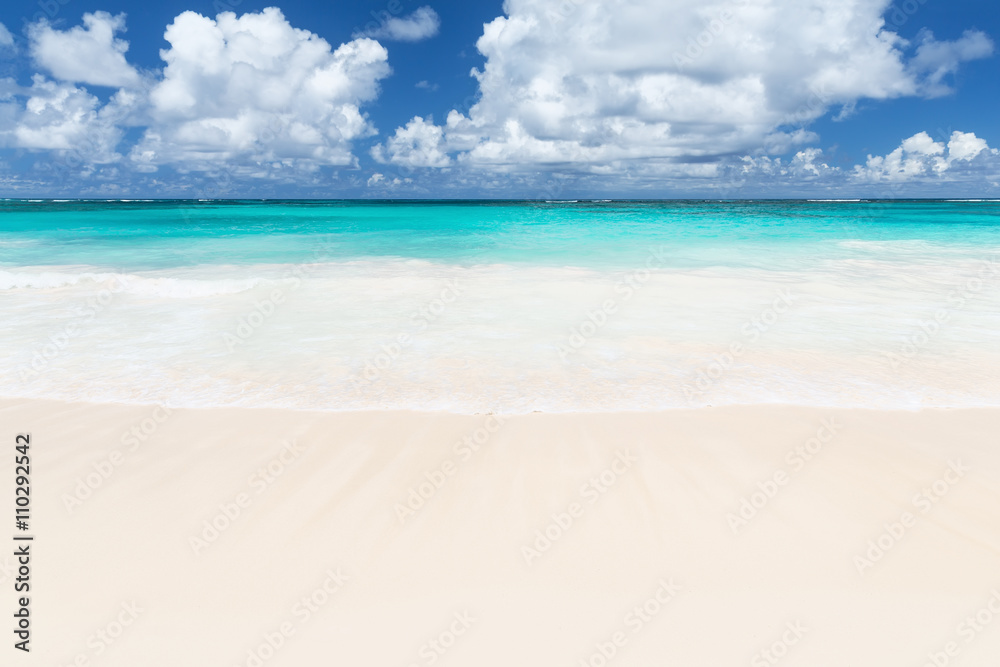 Wave of the sea on the sand beach