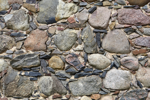 Hand made ancient stone wall.