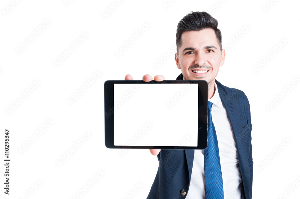 Cheerful businessman shows the screen of modern tablet Cheerful businessman shows the screen of modern tablet