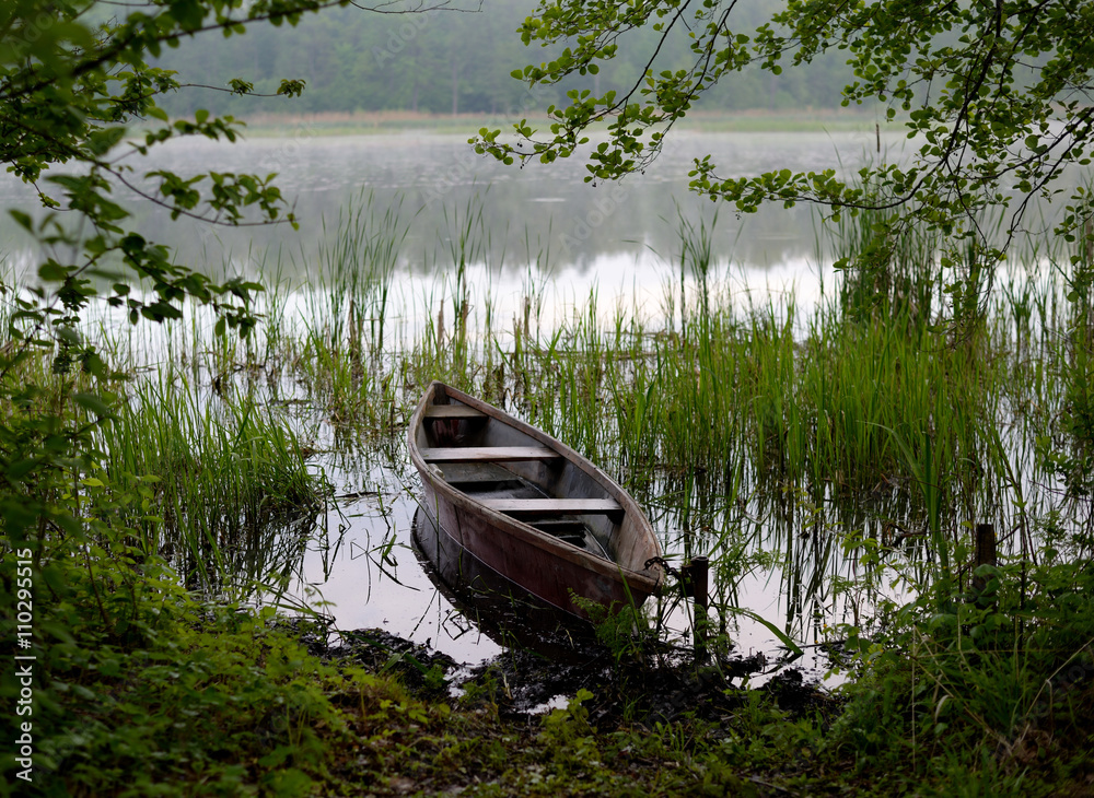 Fishing boat on the river in the morning