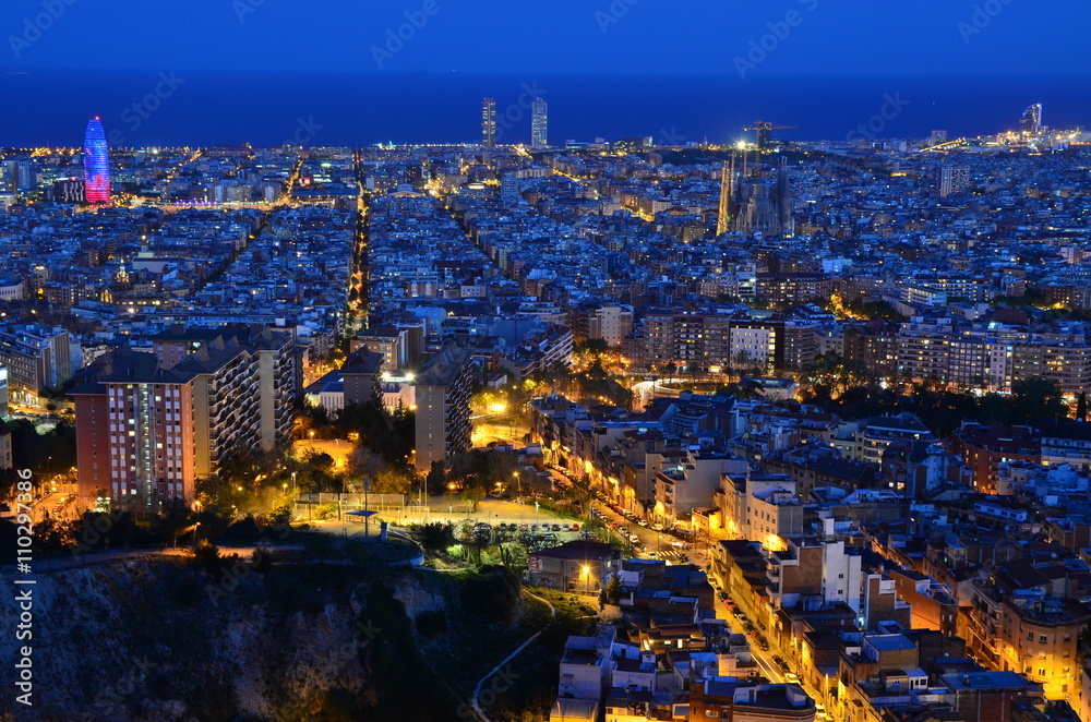 Fototapeta premium Evening Cityscape over Beautiful Barcelona from Turo de la Rovira