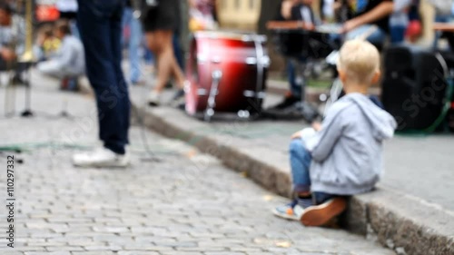 street musician plays the drums   /  street musician plays the drums, the blurred background, the concept of lifestyle