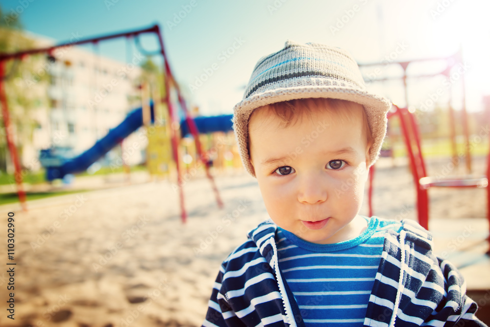 Little boy playing on playground Little boy playing on playground