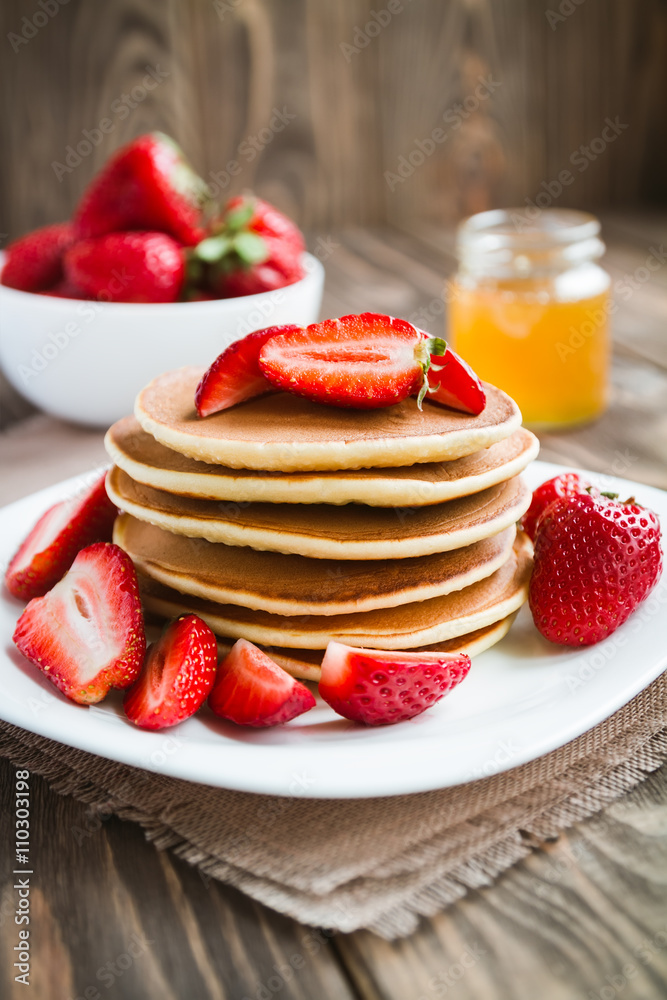Stack of pancakes with strawberries Stack of pancakes with strawberries