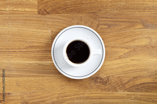 coffee cup on wooden table.