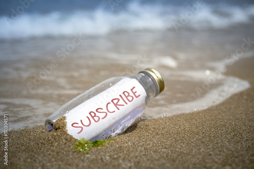 Subscrube invitation in a bottle