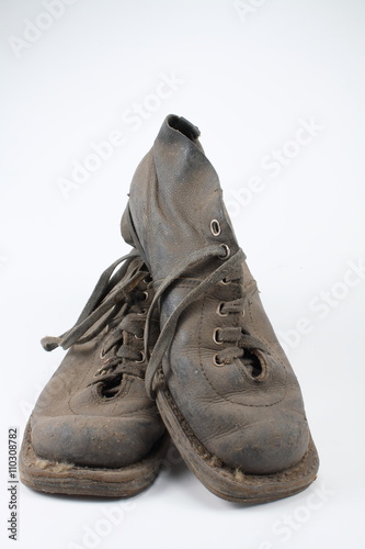 Old shoes on a white background
