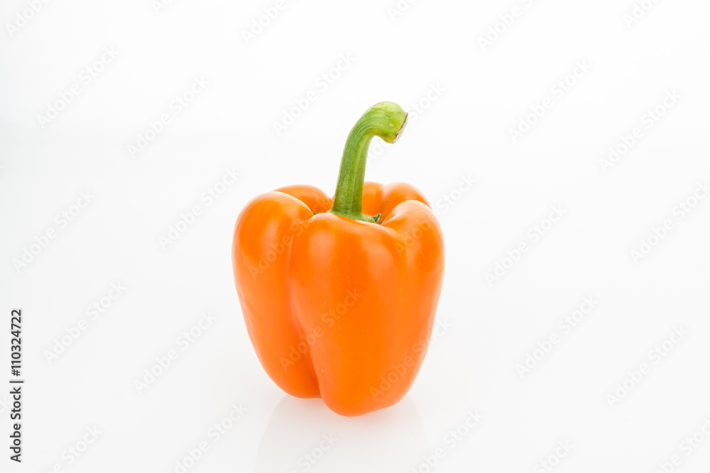 Fresh orange bell pepper, isolated on white background. Fresh orange bell pepper, isolated on white background.