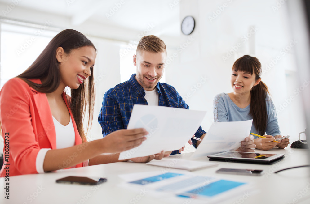 happy creative team or students working at office happy creative team or students working at office